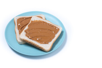Bread toast with peanut butter cream isolated on white background. Copy space