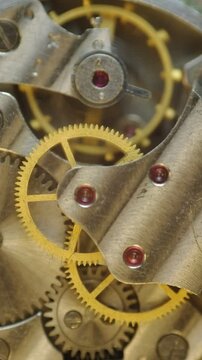 Metal Cogwheels inside clockwork. Macro. Concept Eternity, Teamwork , Idea Technology. Tick-Tick Sound