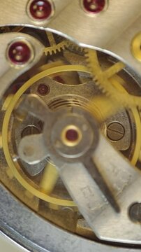 Metal Cogwheels inside clockwork. Macro. Concept Eternity, Teamwork , Idea Technology. Tick-Tick Sound