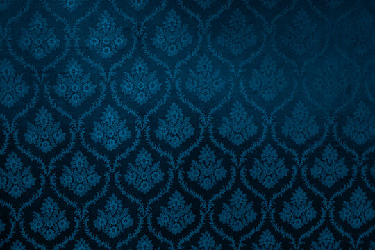 Fototapeta Closeup of blue victorian vintage textured textile wall