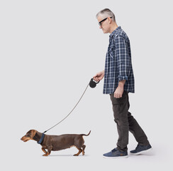 Man walking the dog profile view
