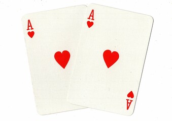 A hand of playing cards showing an identical pair on a white background.