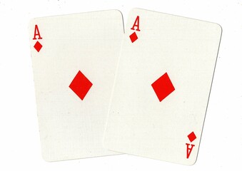 A hand of playing cards showing an identical pair on a white background.