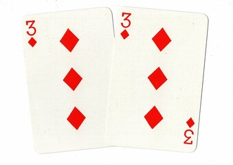 A hand of playing cards showing an identical pair on a white background.