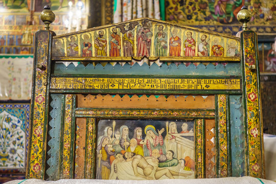Part of the back of a chair from Vank Cathedral, Isfahan, Iran. Chair is decorated with patterns and scenes from the life of Jesus Christ. Top row shows the 12 apostles. Work of a 17th-century master