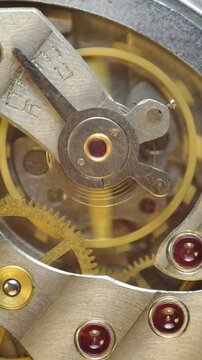 Metal Cogwheels inside clockwork. Macro. Concept Eternity, Teamwork , Idea Technology. Tick-Tick Sound