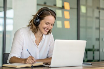 Happy Woman in Headphones Taking Online Course