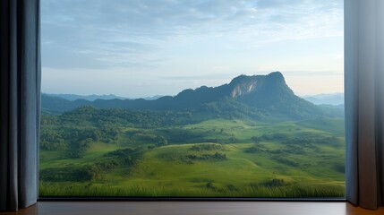 View from the large panoramic window over the green mountain