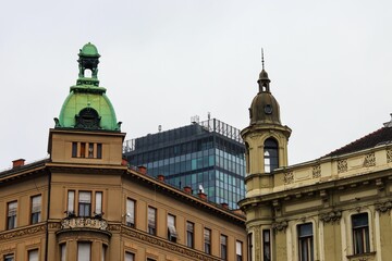 Fototapeta premium Historic and modern architectural contrast.