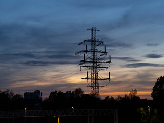 Power Line Tower at Sunset With a Dramatic Sky