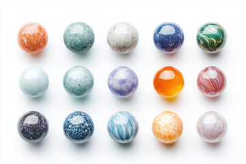 Collection of colorful glass marbles with vibrant patterns on white background