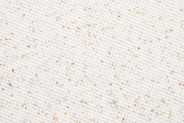Beige grain circle embossed texture as background