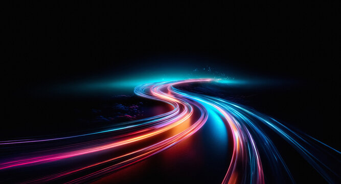 Streaking colorful lights on black backdrop. Dynamic motion created by vibrant blue, cyan, red, and pink light trails in dark space.