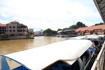 MELAKA, MALAYSIA - May 5, 2024 :  View of the World Heritage city of Melaka from the water