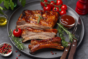 BBQ ribs, delicious grilled meat dish, grey background