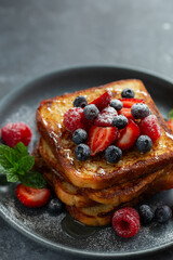 french toasts with honey and fresh berries