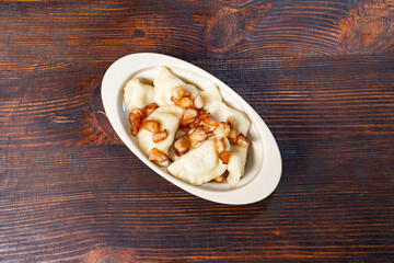 Delicious dumplings served on a rustic wooden table