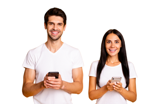 Photo of two people addicted to reposts and subscribers can't live without telephones wear casual clothes isolated yellow color background