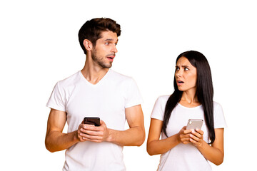 Photo of two people addicted telephones upset of bad followers reaction on new post wear casual...