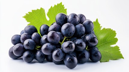 Fototapeta premium A bunch of dark-purple grapes with green leaves. Perfect for healthy food, wine, or autumn themes.
