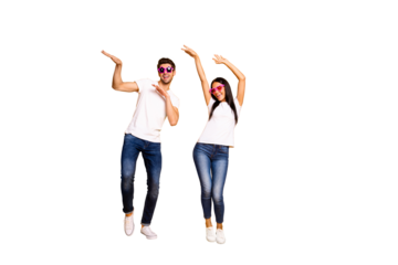 Full length photo of two crazy people dancing at first season theme party wear cool specs and casual clothes isolated yellow color background