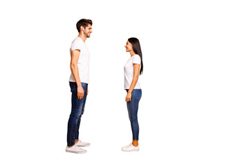 Obraz premium Full body profile photo of pair lady and guy looking eyes overjoyed by meeting wear casual outfit isolated yellow color background