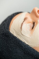 Luxurious Facial Treatment in Spa Soft Towel Wrap and Cream Mask for Tranquil Relaxation - Showcasing Premium Skincare Techniques for Modern Wellness Industries