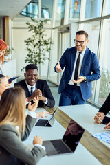 Team Collaboration During a Business Meeting in a Modern Office Environment