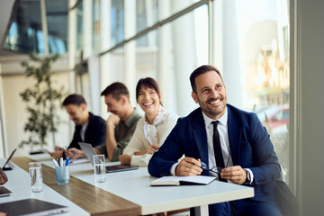 Business Team Sharing a Lively Moment During a Productive Office Meeting