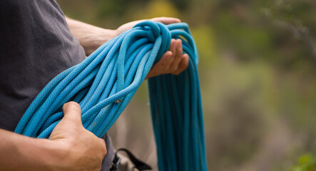 Man with a rope climbing in the mountains. Climbing in the mountains of Spain. Technical...
