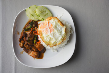 Crispy pork basil rice with fried egg