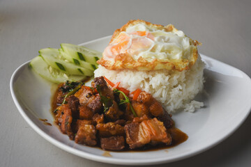 Crispy pork basil rice with fried egg