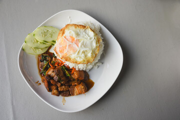 Crispy pork basil rice with fried egg
