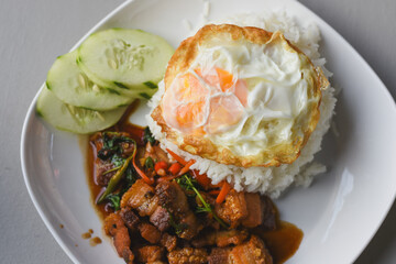 Crispy pork basil rice with fried egg