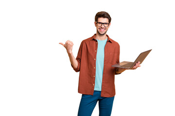 Portrait of his he nice attractive cheerful successful content brunet guy holding in hands laptop...