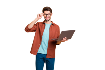 Portrait of his he nice attractive cheerful cheery successful content brunet guy holding in hands laptop working part-time home-based isolated over beige color pastel background