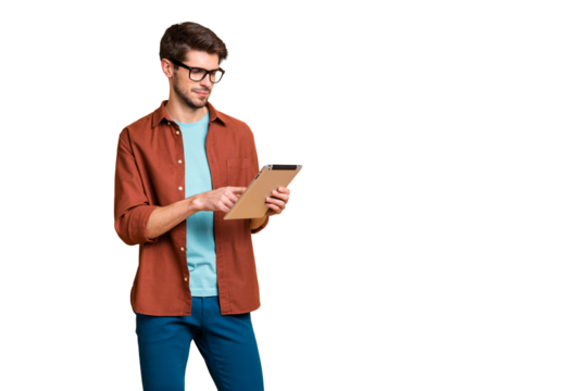 Portrait of his he nice attractive calm focused successful content brunet guy holding in hands reading digital e-book isolated over beige color pastel background