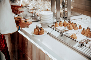 Sweet dessert table hotel restaurant, cafe dining room sell various delicacies