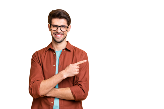Close-up portrait of his he nice attractive cheerful cheery glad successful content brunet guy pointing forefinger aside advice advert solution isolated over beige color pastel background