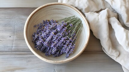 Rustic ceramic bowl holding dried lavender, modern farmhouse style, visible clay imperfections, morning window light, and dusty purple and cream palette, placed on a wooden dining table.