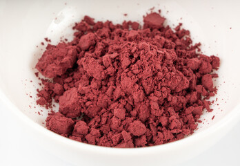 Acai powder circle pile, violet superfood dust, pink fruit flour extract mound