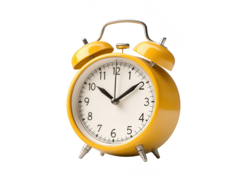 A yellow alarm clock with a white face showing the time as 10:30