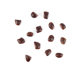 Dried tamarind seeds isolated, Tamarindus indica beans on a white background, medicine ingredient