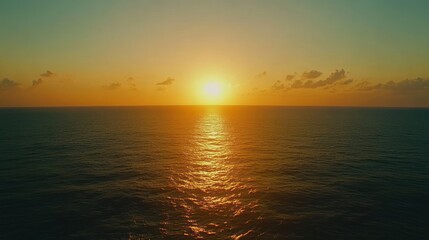 Fototapeta premium Ocean sunset aerial view, golden hour, calm sea, cloudscape, travel