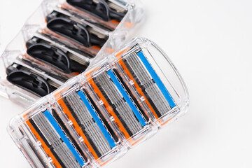 Cartridges of Razor Blades for shaving on white background, close up photo. Men's razor for shaving of beard.