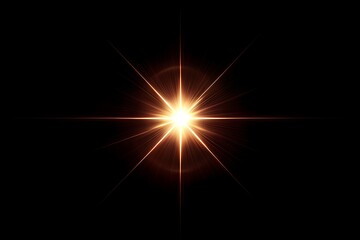 Bright golden starburst lens flare on black background.
