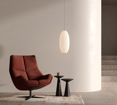 Modern interior with a burnt-orange swivel chair, black side tables, and a pendant light against a neutral curved wall. Soft lighting enhances the cozy, elegant, and contemporary ambiance.