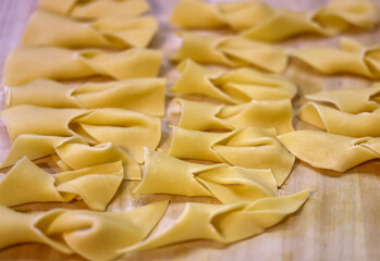 Angel wings (Faworki), cakes. Raw sweet pastry prepared for deep fried