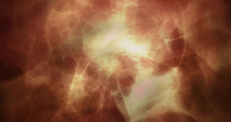 Image of yellow glowing light trails moving over black background