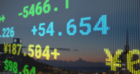 Image of stock market and diagrams over cityscape